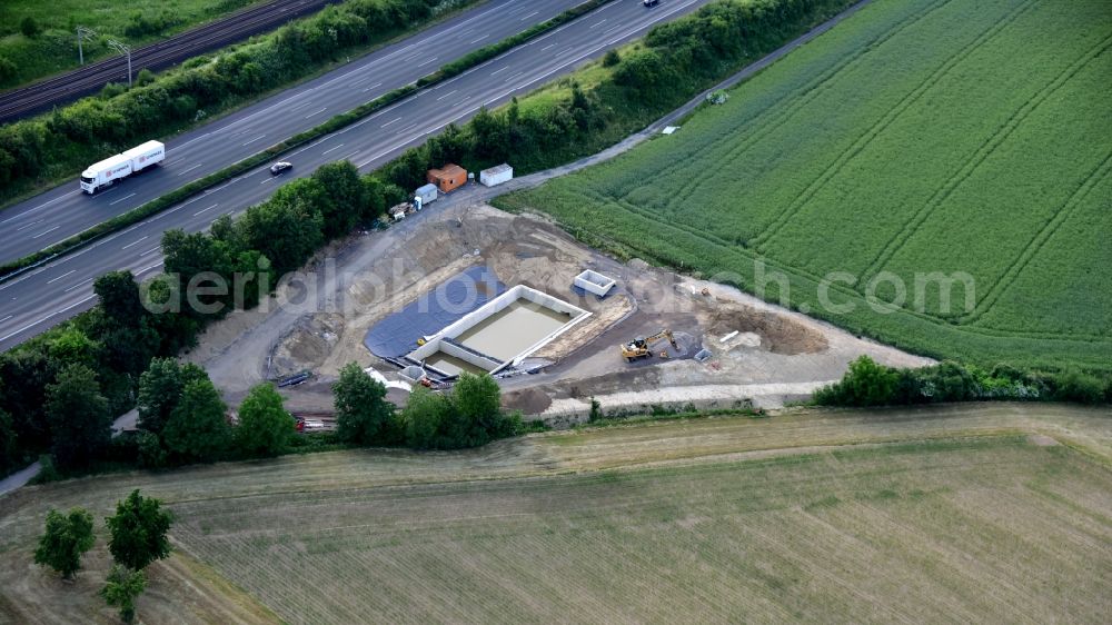 Aerial image Bockeroth - Construction site for the new construction of the retention basin and water storage on motorway BAB A3 in Bockeroth in the state North Rhine-Westphalia, Germany