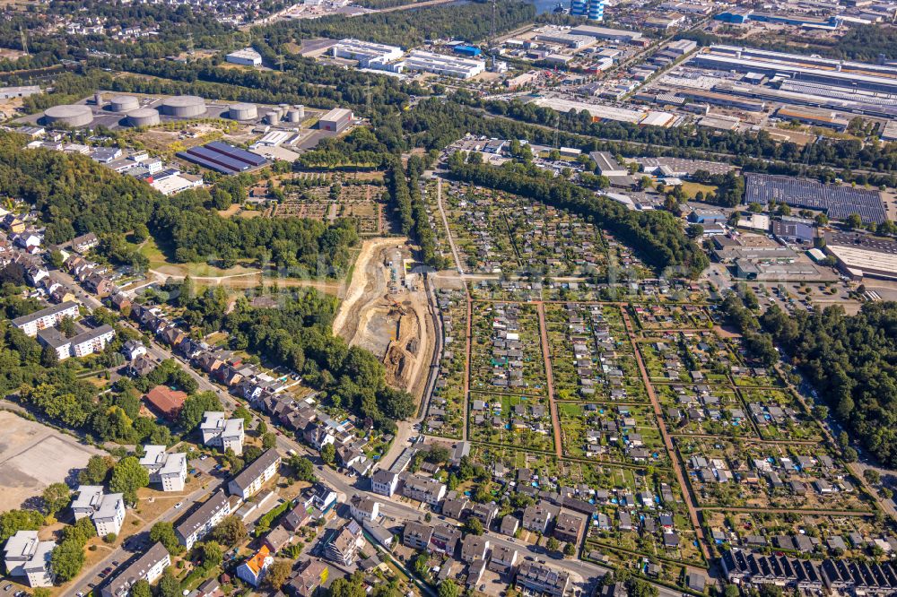 Essen from above - Construction site for the new construction of the retention basin and water storage at the Pausmuehlenbach next to the allotment garden settlement of the allotment garden association Weidkamp in the district Gerschede in Essen at Ruhrgebiet in the state North Rhine-Westphalia, Germany