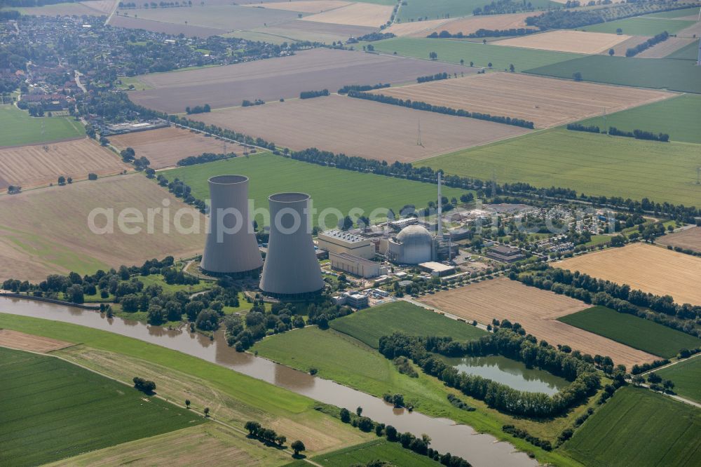 Aerial photograph Grohnde - Reactor blocks, cooling tower structures and facilities of the nuclear power plant in Grohnde in the state of Lower Saxony, Germany