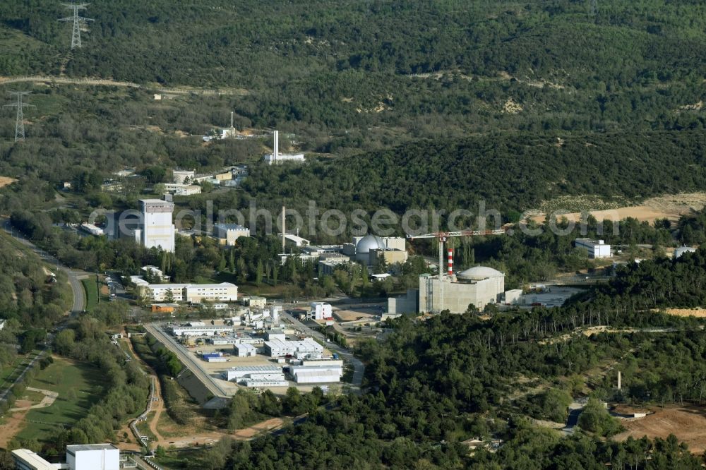 Saint-Paul-lez-Durance from the bird's eye view: Building remains of the reactor units and facilities of the NPP nuclear power plant institut CEA Cadarache in Saint-Paul-lez-Durance in Provence-Alpes-Cote d'Azur, France