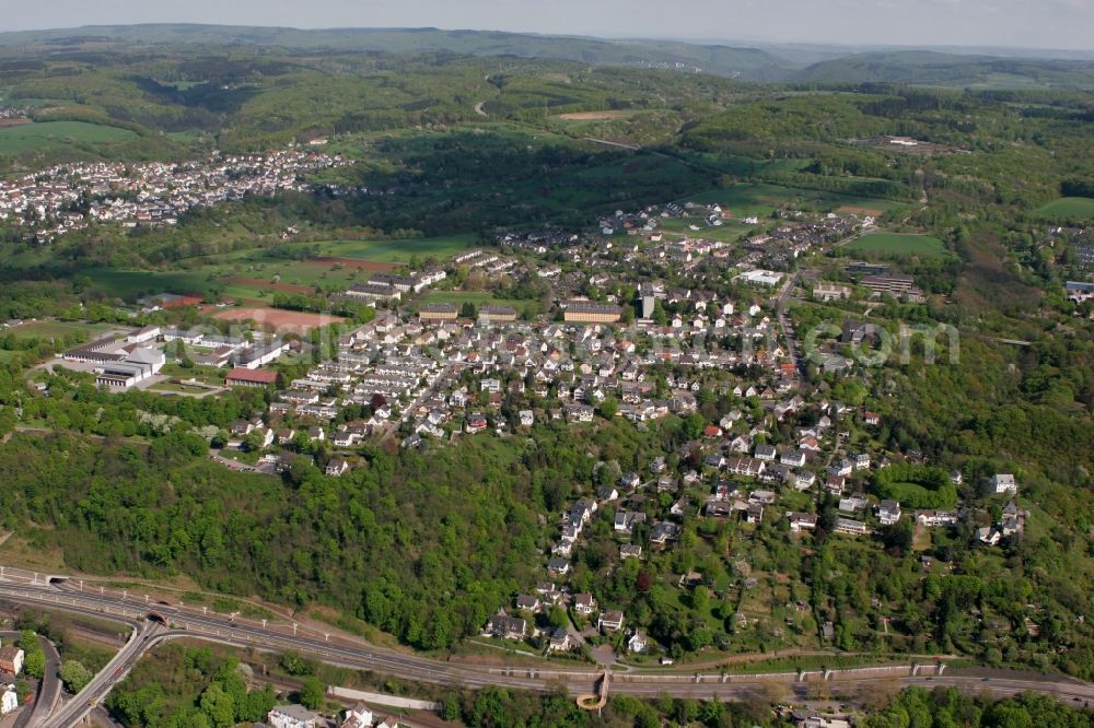 Aerial image Koblenz - Parts of Koblenz located on the right Rhine side and the federal road 49 in Koblenz in the state of Rhineland-Palatinate. The city parts - like Asterstein - are located on the right riverbank and partly wooded or surrounded by forest, hills and nature. The road 49 in the foreground takes its course along the river and through Koblenz