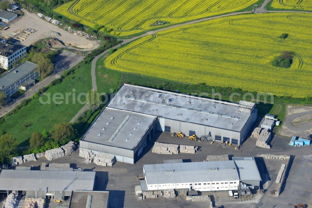 Aerial photograph Berlin - Recycling facilities in the industrial and commercial area in the Mahlsdorf part of the district of Marzahn-Hellersdorf in Berlin in Germany. The compound with its halls is located on the Eastern edge of a field in the South of the locality