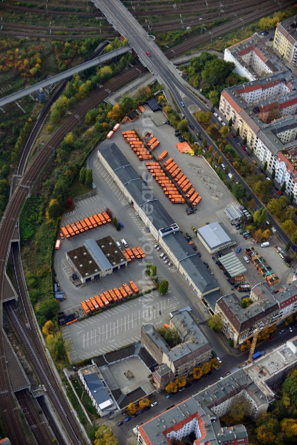 Berlin from above - View of the recycling yard Behmstrasse of the BSR ( Berlin City Cleaning Services ) in Berlin - Pankow. Located directly next to the railway network of the S-Bahn, the yard is also a collecting point for pollutant waste