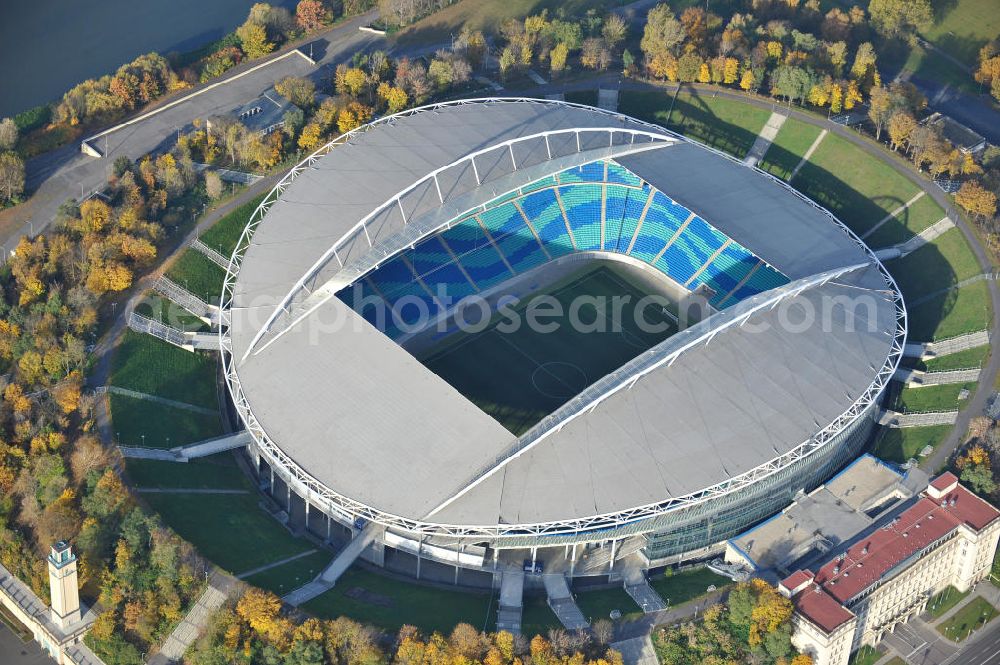 Aerial image Leipzig - Blick auf die Red Bull Arena (vormals Zentralstadion), dem größten Stadion der sächsischen Stadt Leipzig und dem größten auf dem Gebiet der neuen Bundesländer. Das Stadion ist Teil des Leipziger Sportforums und liegt neben der neu gebauten Arena Leipzig, der Festwiese sowie weiteren (kleineren) Sportstätten und -hallen westlich der Innenstadt. Das Stadion ist die Heimstätte von RB Leipzig. View of Red Bull Arena (formerly Central Stadium), the largest stadium in the Saxon city of Leipzig and the largest in the area of the new federal states.