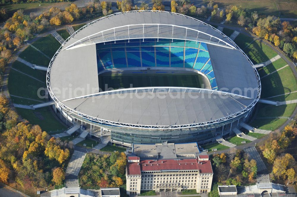 Aerial photograph Leipzig - Blick auf die Red Bull Arena (vormals Zentralstadion), dem größten Stadion der sächsischen Stadt Leipzig und dem größten auf dem Gebiet der neuen Bundesländer. Das Stadion ist Teil des Leipziger Sportforums und liegt neben der neu gebauten Arena Leipzig, der Festwiese sowie weiteren (kleineren) Sportstätten und -hallen westlich der Innenstadt. Das Stadion ist die Heimstätte von RB Leipzig. View of Red Bull Arena (formerly Central Stadium), the largest stadium in the Saxon city of Leipzig and the largest in the area of the new federal states.