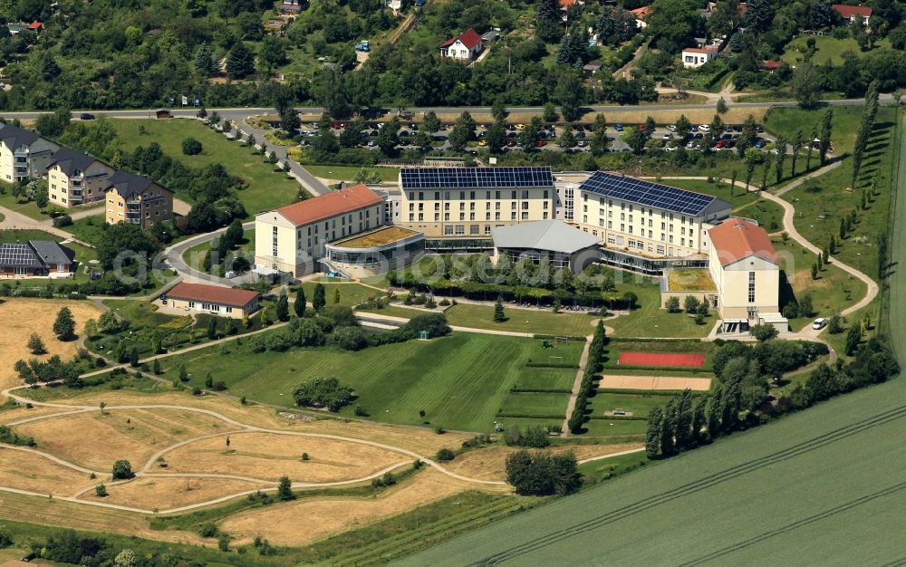 Aerial photograph Bad Frankenhausen/Kyffhäuser - The rehabilitation center of Bad Frankenhausen is on the southern slope of the Kyffhaeuser in Thuringia. The rehab clinic specializes in the rehabilitation of Psychosomatic Medicine and Orthopedics. In the spa town of Bad Frankenhausen patients have the best chance of recovery. Operated the rehabilitation facility of the German pension insurance