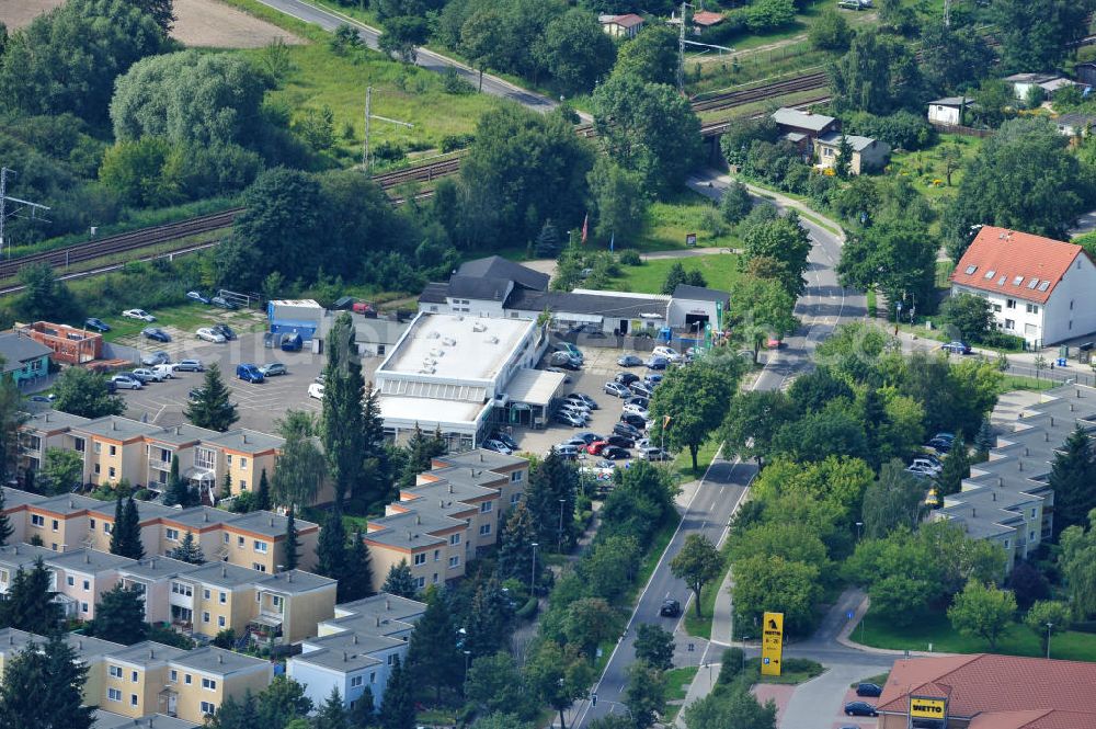 Bernau from above - Blick auf Erweiterungsbauarbeiten in der Reifen- und KFZ - Werkstatt an der Zepernicker Chausse in 16321 Bernau. Automobile tires - workshop at Zepernicker Chausse in 16321 Bernau.