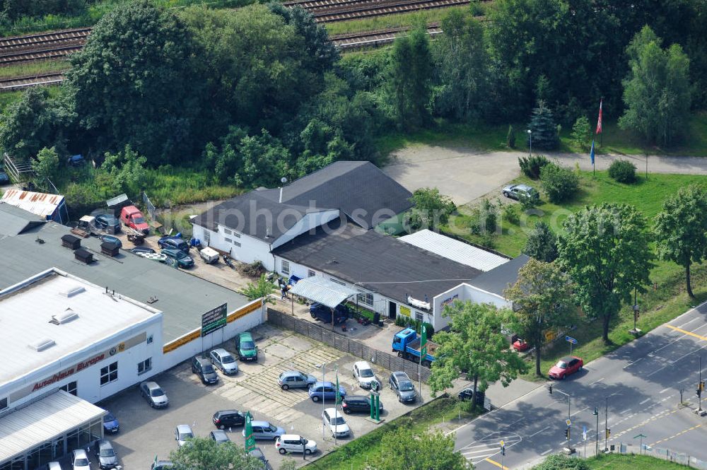 Bernau from the bird's eye view: Blick auf Erweiterungsbauarbeiten in der Reifen- und KFZ - Werkstatt an der Zepernicker Chausse in 16321 Bernau. Automobile tires - workshop at Zepernicker Chausse in 16321 Bernau.