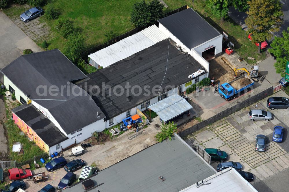 Bernau from the bird's eye view: Blick auf Erweiterungsbauarbeiten in der Reifen- und KFZ - Werkstatt an der Zepernicker Chausse in 16321 Bernau. Automobile tires - workshop at Zepernicker Chausse in 16321 Bernau.