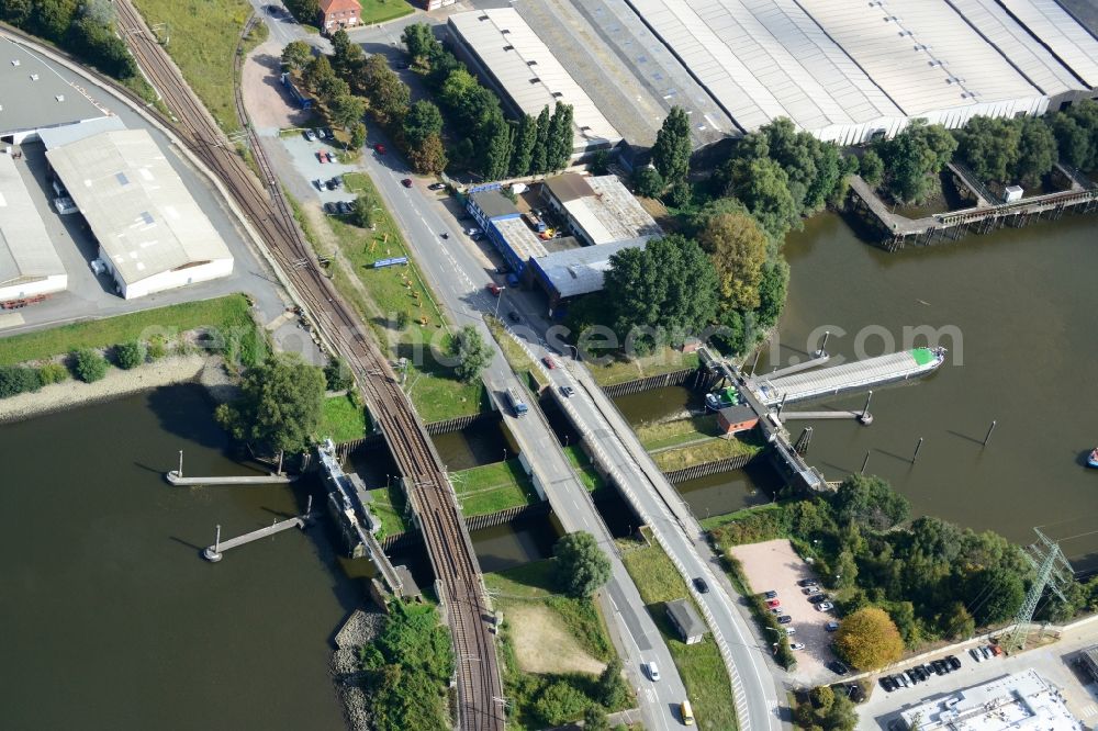 Hamburg from the bird's eye view: Reiherstieg lock with road bridges and railway bridge in Hamburg-Heimfeld. A project of the Hamburg Port Authority HPA