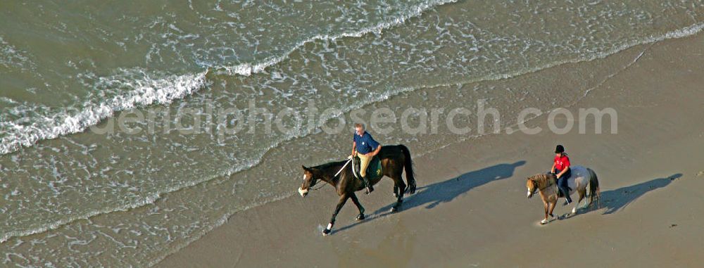 Aerial photograph Norderney - Blick auf Reiter am Strand von Norderney. View of riders on the beach of Norderney.