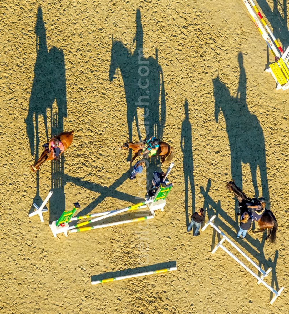 Hamm from above - Building of stables with obstacle training with long shadows at the riding Rhynern in Hamm in the state North Rhine-Westphalia