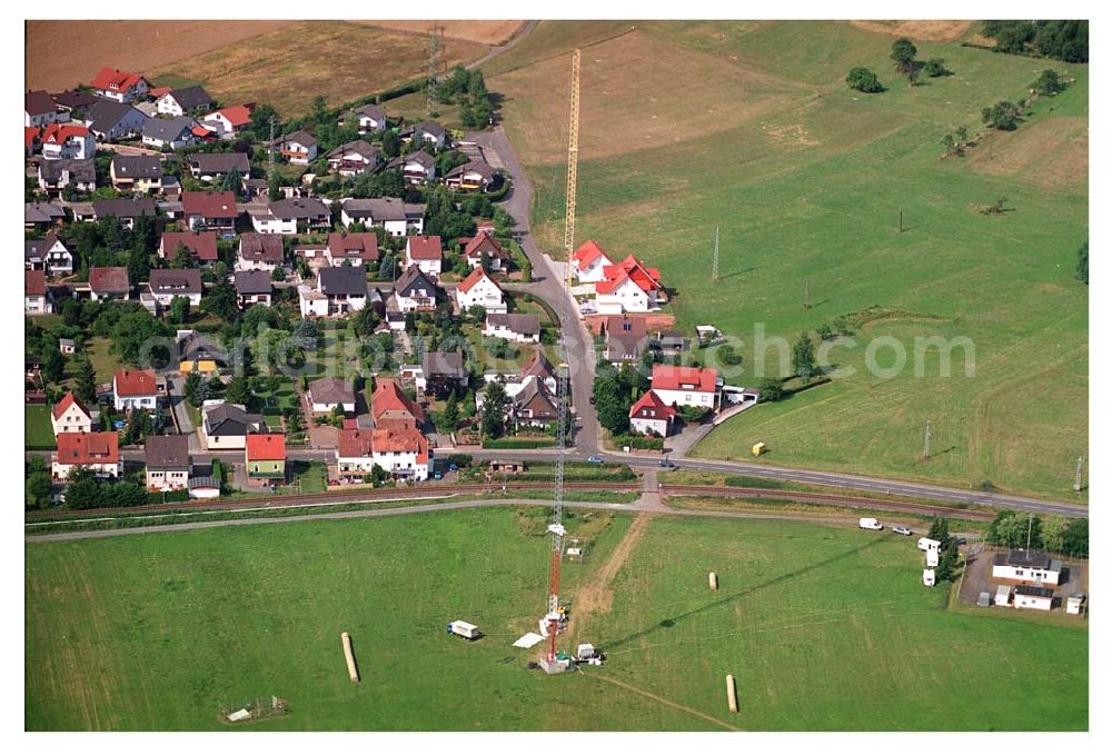 Aerial photograph Sambach/ Rheinland-Pfalz - Blick auf die Rekonstruktionsarbeiten am Sendemast Sambach (Sandstrahlarbeiten Firma Werner Diener GmbH & Co)