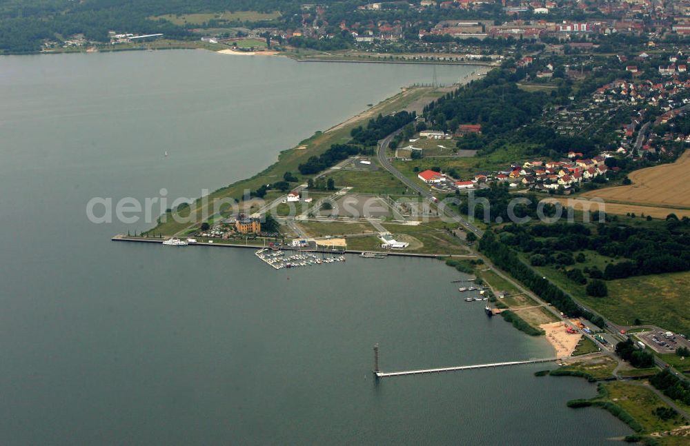 Bitterfeld from above - Blick auf die Rekultivierungsfläche am Bernsteinsee in Bitterfeld.Das Gelände an der B100 in Richtung Goitzsche wird geschückt durch ein Anwesen, das den phantasievollen Namen „Villa am Bernsteinsee“ trägt. Die ehemals „Biermannsche Villa“ wurde 1896 im prunkvollen Stil der Neorenaissance errichtet. View of the reclamation area on Bernsteinsee in Bitterfeld.