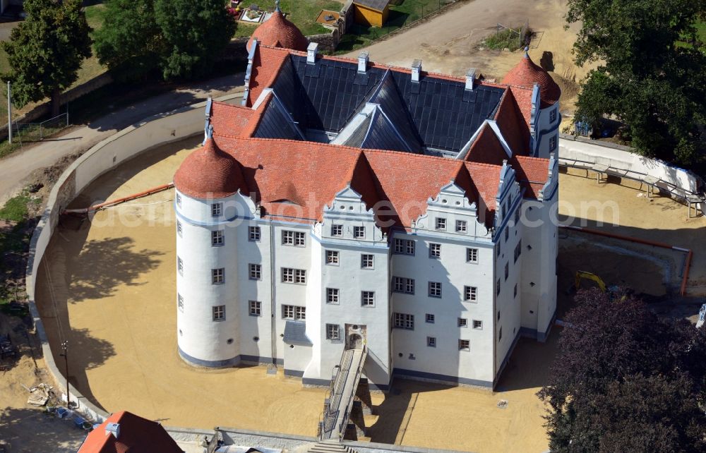 Großkmehlen from above - View of 16th century renaissance castle Grosskmehlen in the state Brandenburg. The moated castle was renovated and refurbished by the Brandenburgische Schloesser GmbH