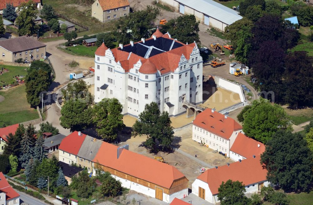 Großkmehlen from above - View of 16th century renaissance castle Grosskmehlen in the state Brandenburg. The moated castle was renovated and refurbished by the Brandenburgische Schloesser GmbH