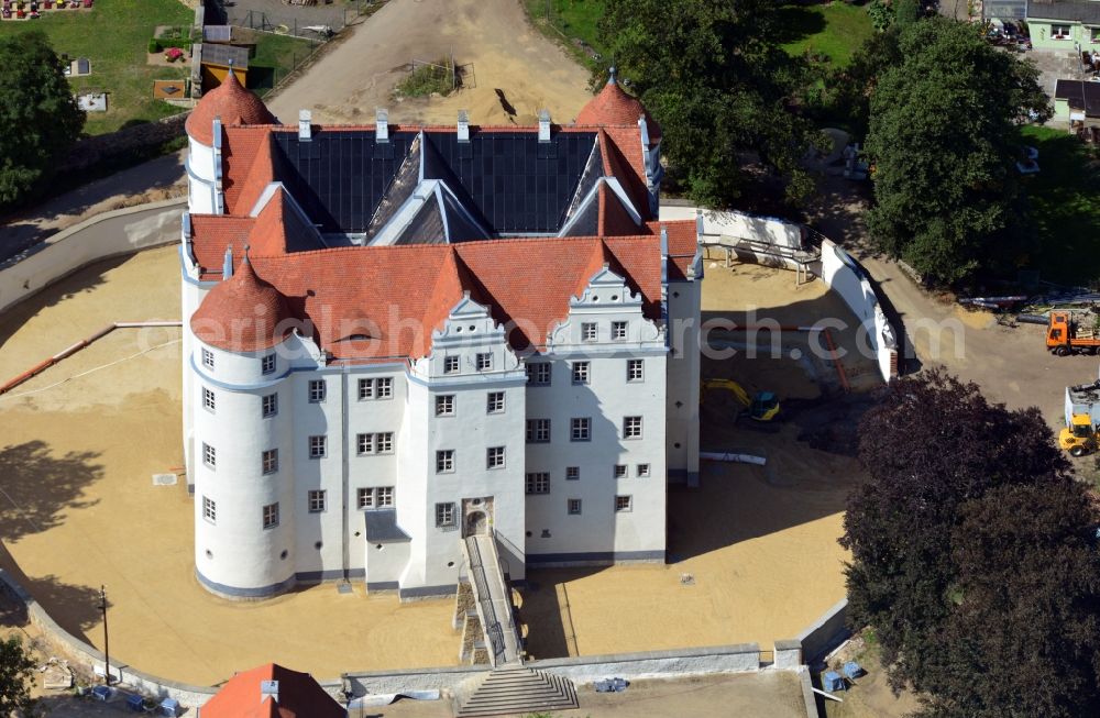 Aerial image Großkmehlen - View of 16th century renaissance castle Grosskmehlen in the state Brandenburg. The moated castle was renovated and refurbished by the Brandenburgische Schloesser GmbH