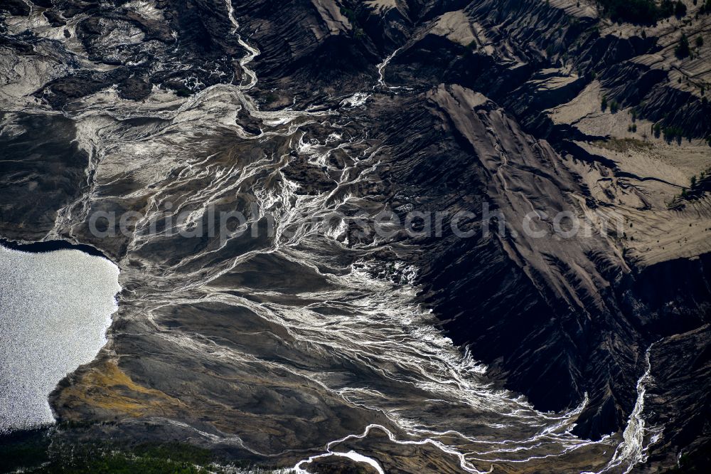 Schipkau from the bird's eye view: Rehabilitation and renaturation work on the layers of a mining waste dump in Schipkau in the state Brandenburg, Germany