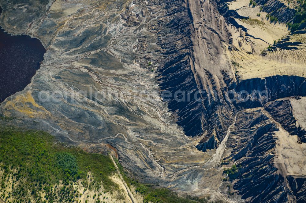 Schipkau from above - Rehabilitation and renaturation work on the layers of a mining waste dump in Schipkau in the state Brandenburg, Germany