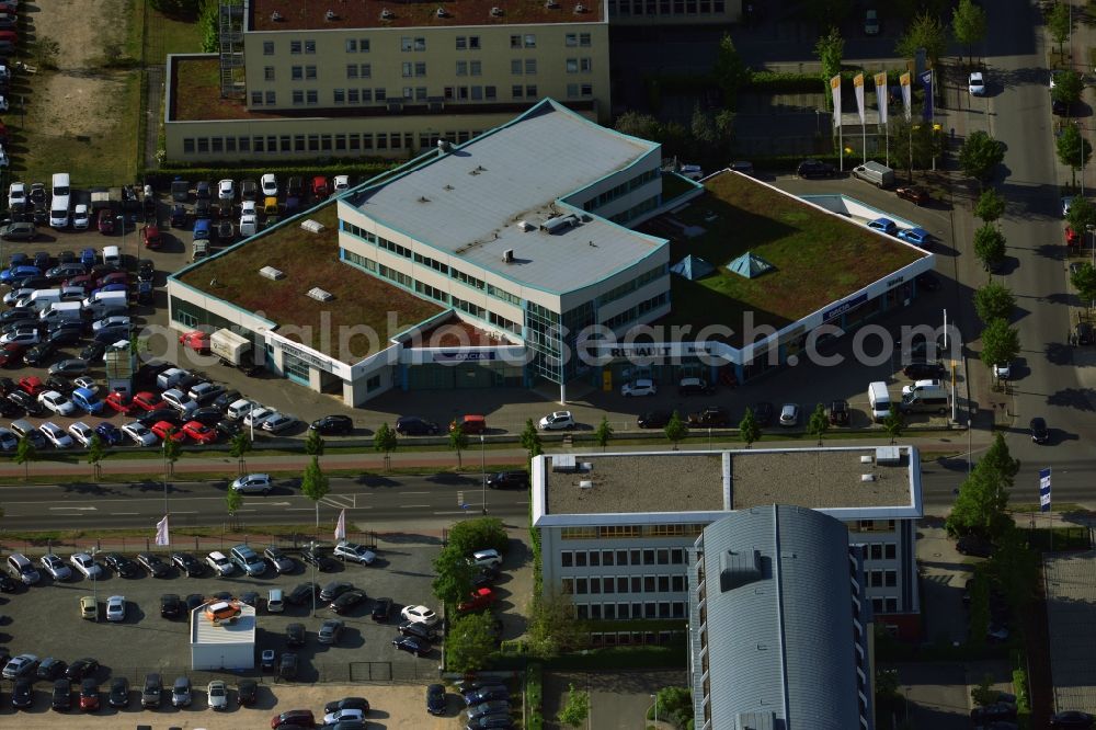 Aerial image Teltow - In the commercial district of Teltow Oderstraße in Brandenburg the dealership Koenig has a branch. Here new and used cars from Renault and Dacia will be offered at a service center car repairs are made