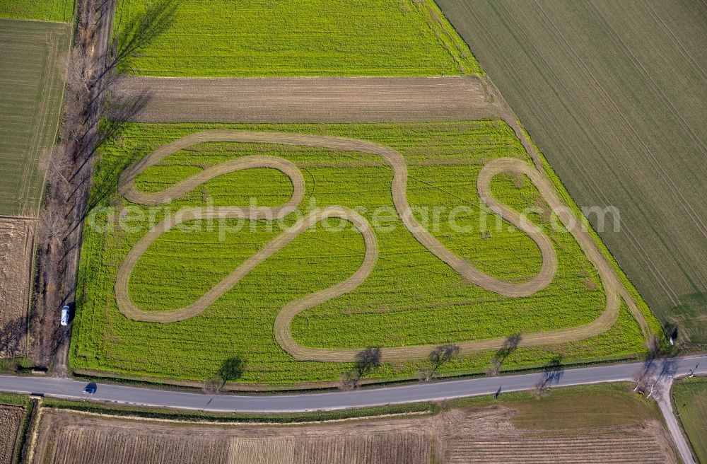 Werl from the bird's eye view: Track on a motor-cross terrain on a harvested field at Werl in the state of North Rhine-Westphalia