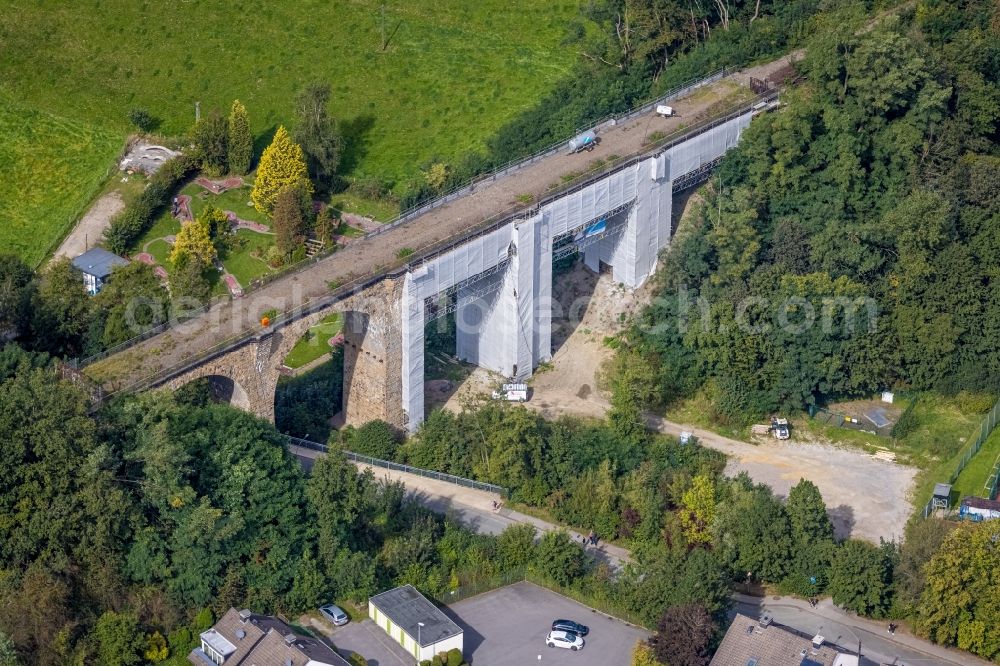 Aerial image Gevelsberg - Renovation work at the abandoned viaduct of the railway bridge structure to route the abandoned railway Witten-Schwelm at Nelkenstreet in Gevelsberg in the state North Rhine-Westphalia