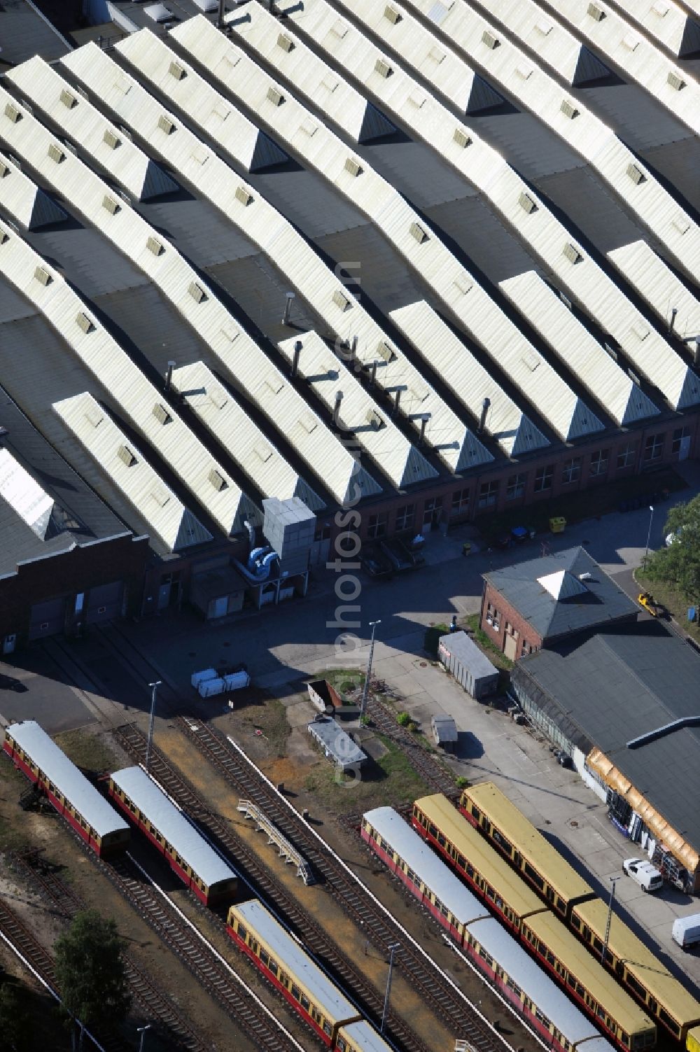 Berlin from the bird's eye view: Area of the sidings from the halls of repairing S-Bahn main workshop / depot in Berlin-Schoeneweide