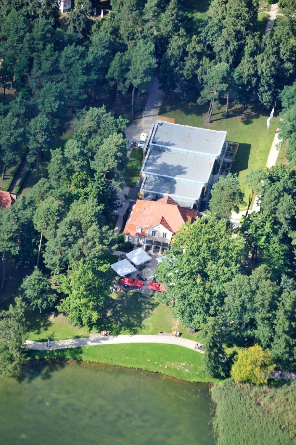 Bad Saarow from above - View of the restaurant Park-Café and the theater am See on the banks of Schamützelsee in Bad Saarow in the state of Brandenburg