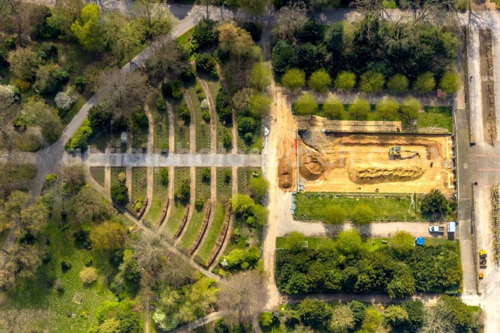 Aerial photograph Dortmund - Restoration of the large pond at the main cemetery in Dortmund in the state of North Rhine-Westphalia, Germany