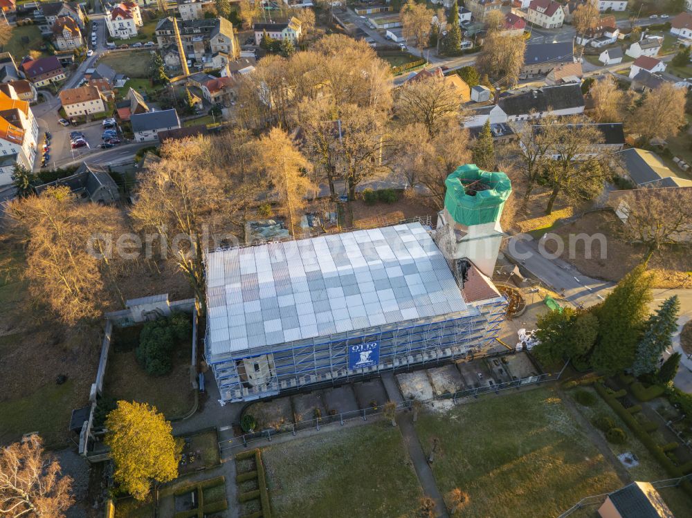 Großröhrsdorf from the bird's eye view: Construction site for the restoration and reconstruction of the church building on street Lichtenberger Strasse in Grossroehrsdorf in the state Saxony, Germany