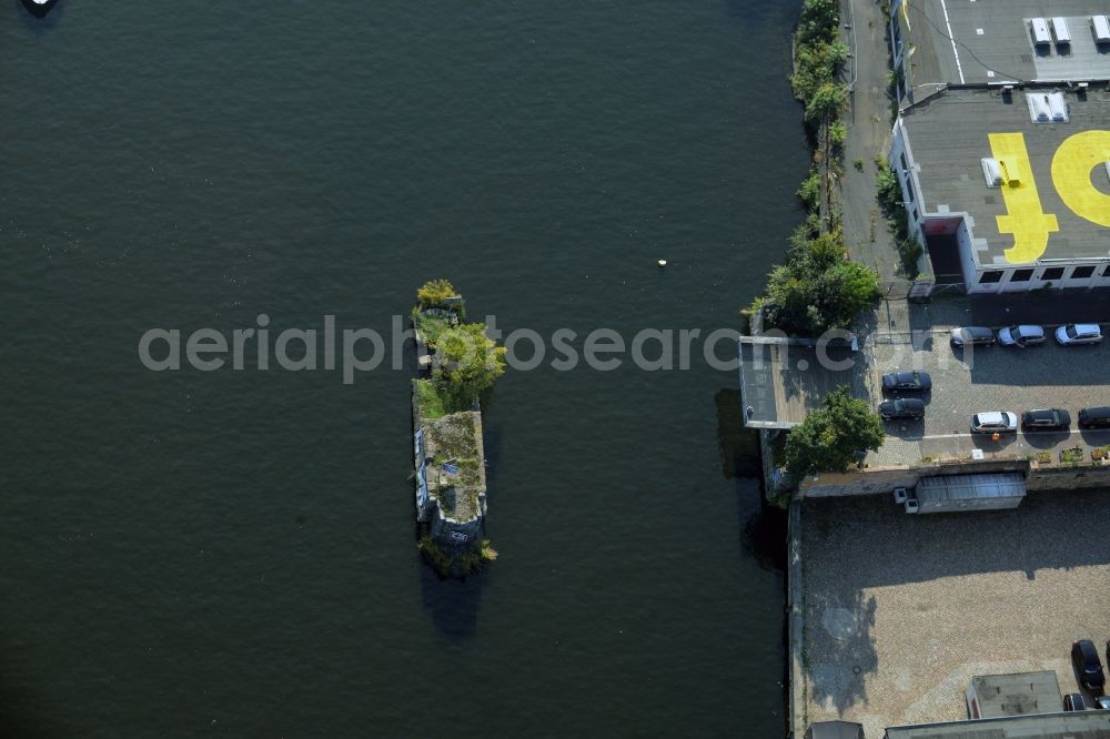 Berlin from above - Remains of the Brommy Bridge in the river Spree in the Kreuzberg part of Berlin in Germany. The remains of the bridge are located at Spreebalkon on the Southern riverbank