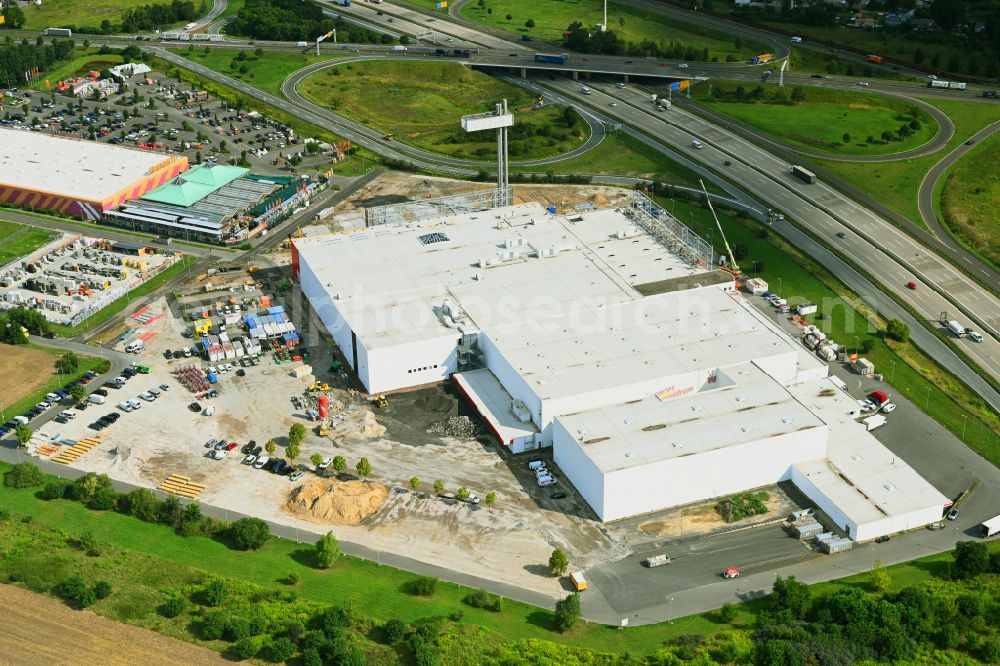 Aerial image Fredersdorf-Vogelsdorf - Revitalization and expansion construction site at the building complex Moebel Hoeffner as part of the shopping center Multicenter Vogelsdorf on Frankfurter Chaussee in Fredersdorf-Vogelsdorf in the federal state of Brandenburg, Germany