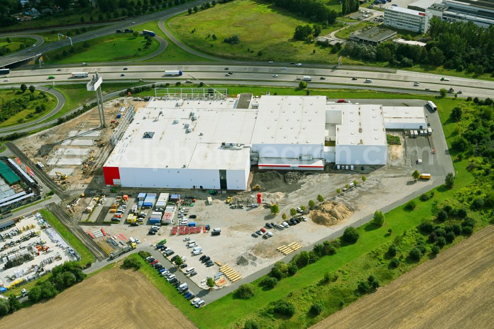 Fredersdorf-Vogelsdorf from the bird's eye view: Revitalization and expansion construction site at the building complex Moebel Hoeffner as part of the shopping center Multicenter Vogelsdorf on Frankfurter Chaussee in Fredersdorf-Vogelsdorf in the federal state of Brandenburg, Germany