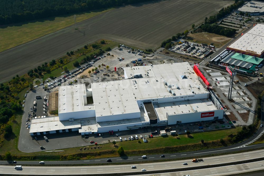 Aerial image Fredersdorf-Vogelsdorf - Revitalization and expansion construction site at the building complex Moebel Hoeffner as part of the shopping center Multicenter Vogelsdorf on Frankfurter Chaussee in Fredersdorf-Vogelsdorf in the federal state of Brandenburg, Germany