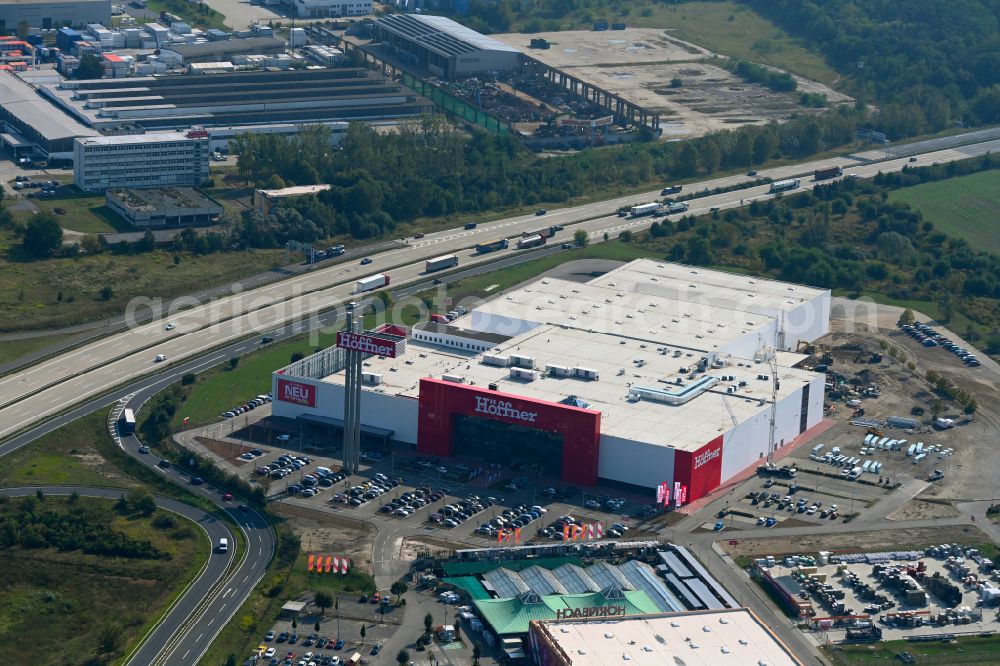 Fredersdorf-Vogelsdorf from above - Revitalization and expansion construction site at the building complex Moebel Hoeffner as part of the shopping center Multicenter Vogelsdorf on Frankfurter Chaussee in Fredersdorf-Vogelsdorf in the federal state of Brandenburg, Germany