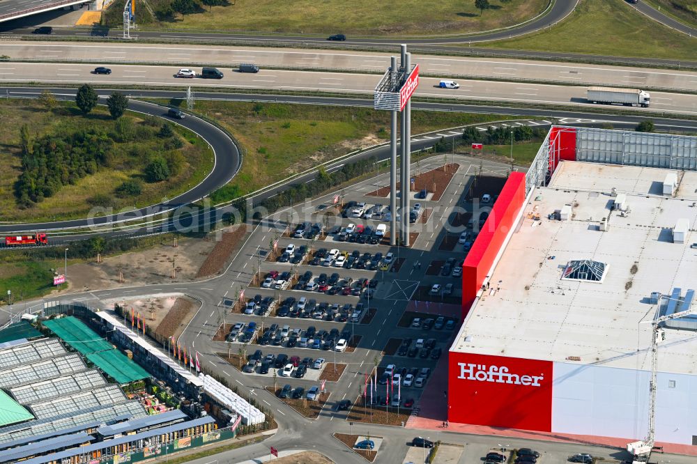 Aerial image Fredersdorf-Vogelsdorf - Revitalization and expansion construction site at the building complex Moebel Hoeffner as part of the shopping center Multicenter Vogelsdorf on Frankfurter Chaussee in Fredersdorf-Vogelsdorf in the federal state of Brandenburg, Germany