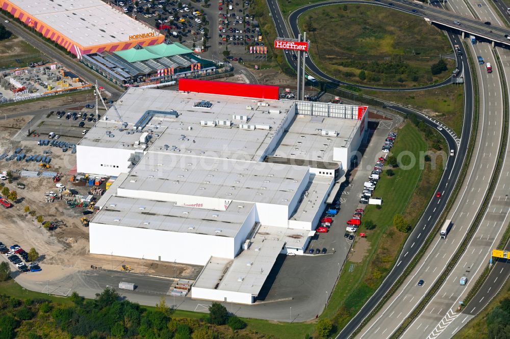 Aerial image Fredersdorf-Vogelsdorf - Revitalization and expansion construction site at the building complex Moebel Hoeffner as part of the shopping center Multicenter Vogelsdorf on Frankfurter Chaussee in Fredersdorf-Vogelsdorf in the federal state of Brandenburg, Germany