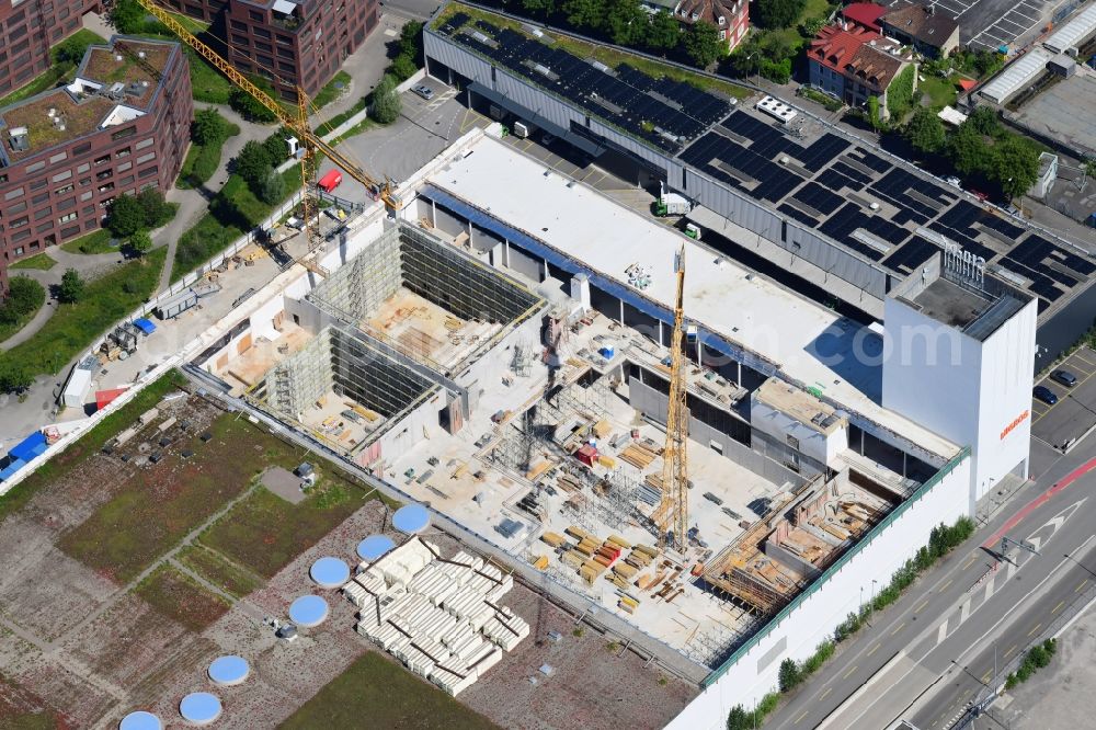 Basel from the bird's eye view: Revitalization and expansion construction at the building complex of the shopping center Stuecki in the district Kleinhueningen in Basel, Switzerland