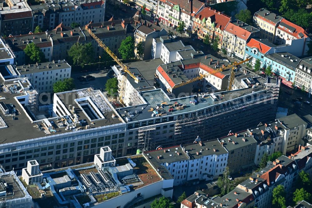 Aerial photograph Berlin - Revitalization and expansion construction at the building complex of the shopping center Tegel Quartier on street Gorkistrasse in the district Tegel in Berlin, Germany