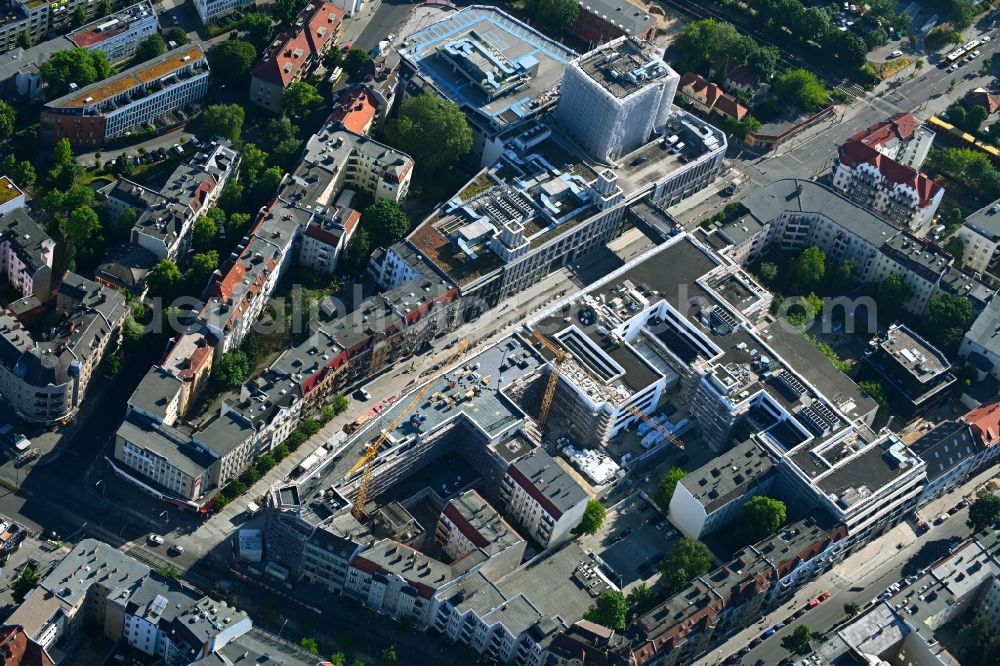 Berlin from the bird's eye view: Revitalization and expansion construction at the building complex of the shopping center Tegel Quartier on street Gorkistrasse in the district Tegel in Berlin, Germany