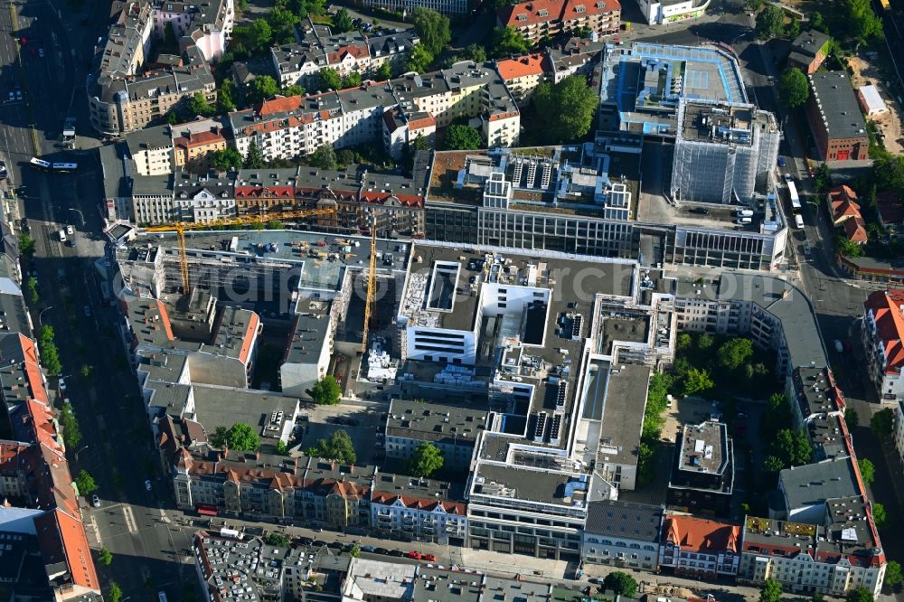 Berlin from above - Revitalization and expansion construction at the building complex of the shopping center Tegel Quartier on street Gorkistrasse in the district Tegel in Berlin, Germany