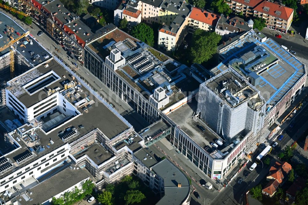 Berlin from the bird's eye view: Revitalization and expansion construction at the building complex of the shopping center Tegel Quartier on street Gorkistrasse in the district Tegel in Berlin, Germany