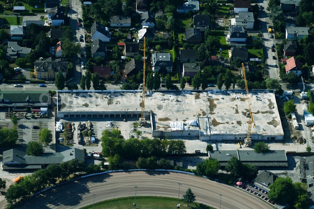 Aerial photograph Berlin - Revitalization and expansion construction at the building complex of the shopping center Titlisweg in the district Mariendorf in Berlin, Germany