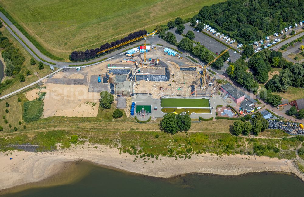 Wesel from the bird's eye view: Construction site for the modernization, renovation and conversion of the swimming pool of the outdoor pool Rheinbad in Wesel at Ruhrgebiet in the state North Rhine-Westphalia, Germany