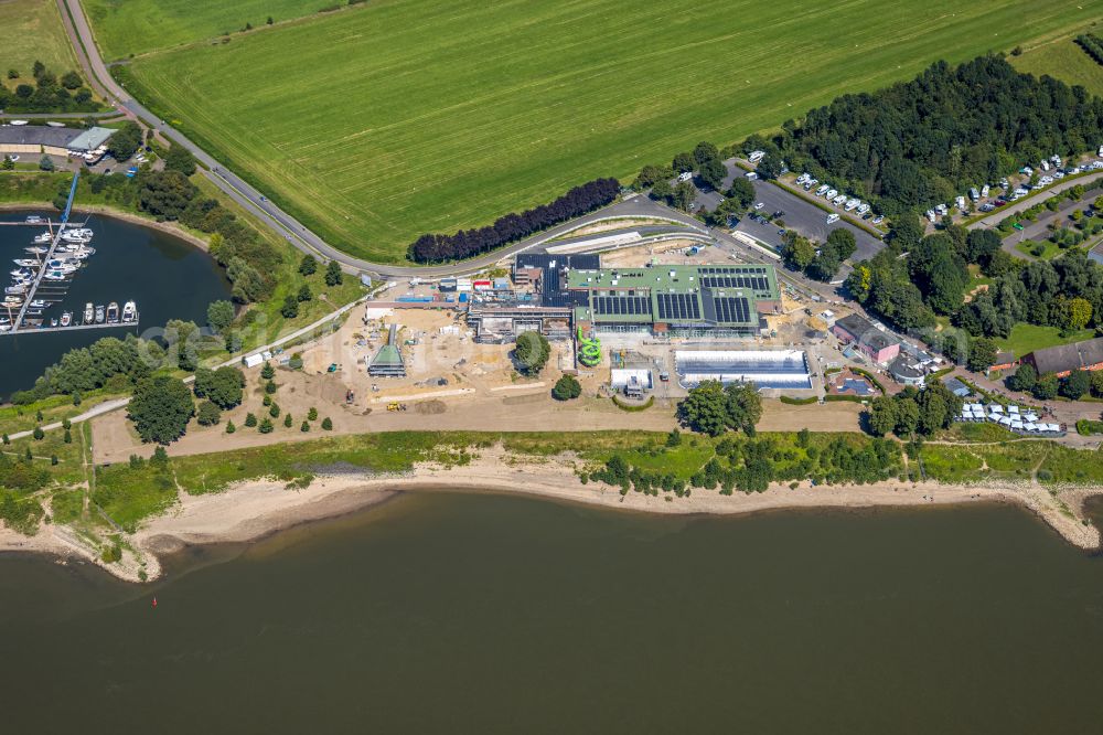 Wesel from above - Construction site for the modernization, renovation and conversion of the swimming pool of the outdoor pool Rheinbad in Wesel at Ruhrgebiet in the state North Rhine-Westphalia, Germany