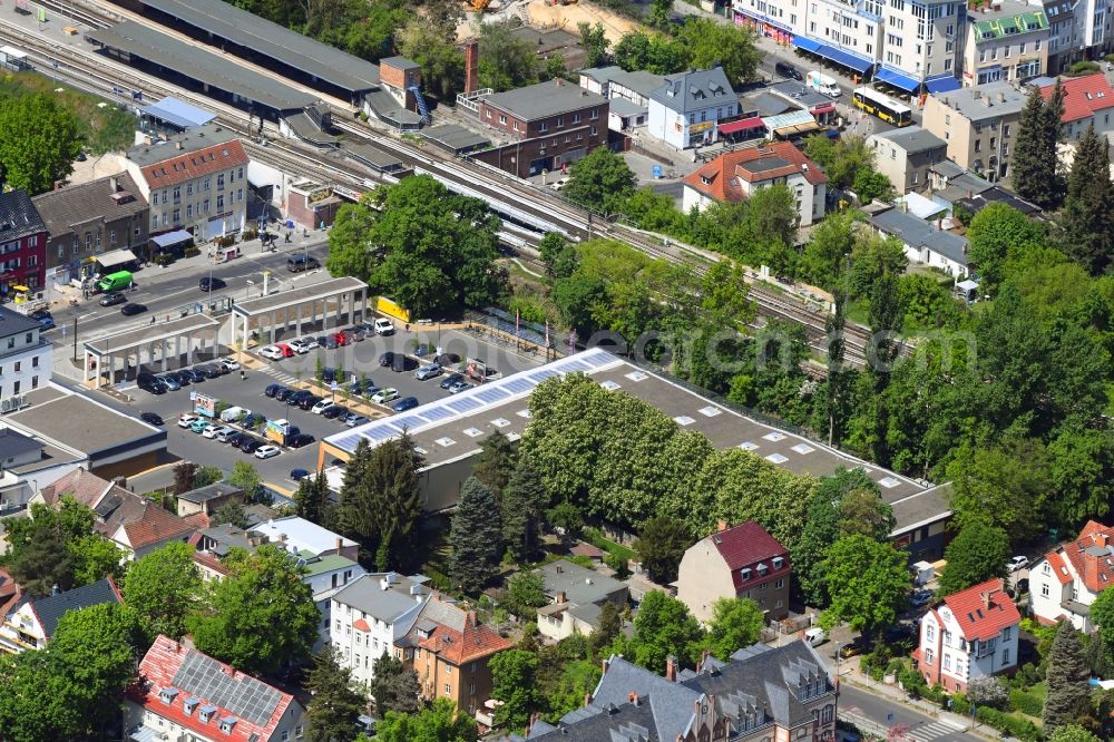 Aerial photograph Berlin - Building complex of the REWE shopping center on Hoenower Strasse in the district Mahlsdorf in Berlin, Germany