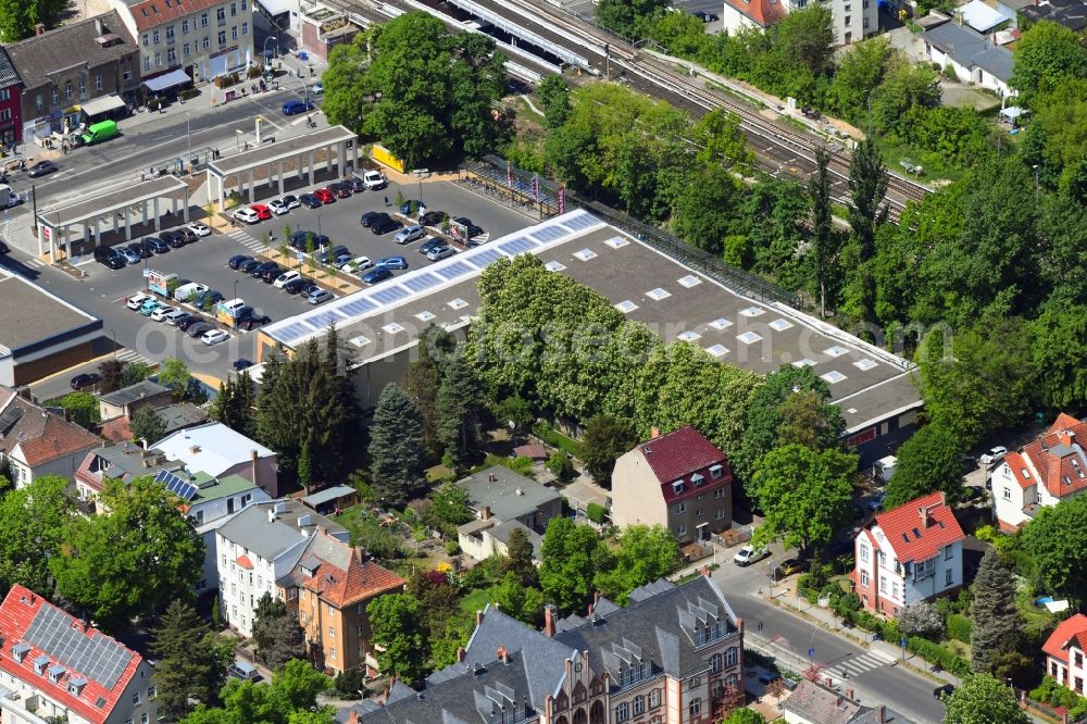 Berlin from the bird's eye view: Building complex of the REWE shopping center on Hoenower Strasse in the district Mahlsdorf in Berlin, Germany