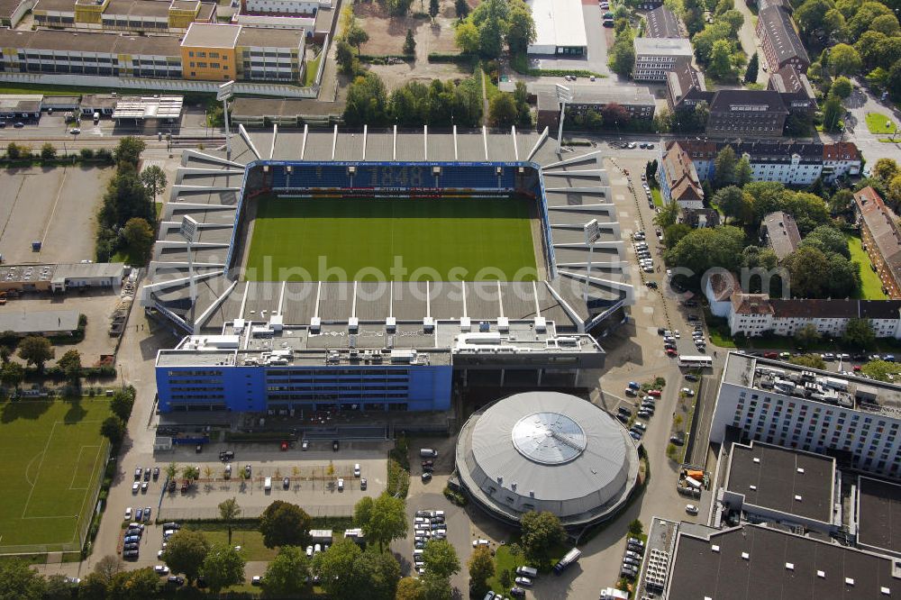 Bochum from above - Das Rewirpowerstadion, bis 2006 Ruhrstadion genannt, ist das Fußballstadion des VfL Bochum in Bochum, Nordrhein-Westfalen. Es ist komplett überdacht und bietet 30000 Zuschauern Platz. The stadium Rewirpowerstadion, until 2006 the Ruhrstadion, is the football stadium of the football club VfL Bochum in Bochum, North Rhine-Westphalia. It is completely roofed and provides space for up to 30.000 viewers.