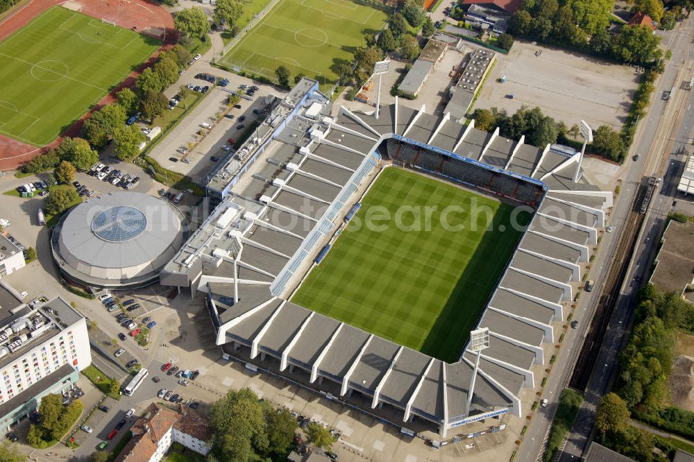 Bochum from the bird's eye view: Das Rewirpowerstadion, bis 2006 Ruhrstadion genannt, ist das Fußballstadion des VfL Bochum in Bochum, Nordrhein-Westfalen. Es ist komplett überdacht und bietet 30000 Zuschauern Platz. The stadium Rewirpowerstadion, until 2006 the Ruhrstadion, is the football stadium of the football club VfL Bochum in Bochum, North Rhine-Westphalia. It is completely roofed and provides space for up to 30.000 viewers.