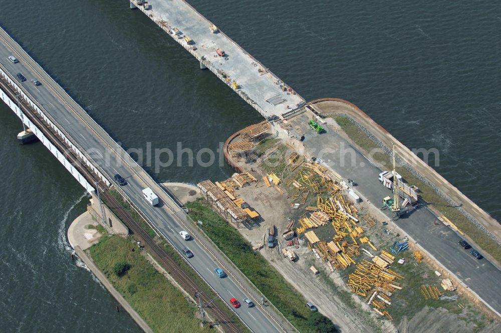 Aerial photograph Stralsund - Blick auf die Strelasundquerung.So wird die heute als feste Verbindung der Insel Rügen zum vorpommerschen Festland bestehende Querung des Strelasundes auf Höhe der Ortschaften Altefähr auf Rügen und der Hanse- und Weltkulturerbestadt Stralsund genannt. Über die erste feste Strelasundquerung, die „Rügendamm“ genannt wird, führen die Bundesstraße 96, eine eingleisige Eisenbahnstrecke und ein kombinierter Fuß- und Radweg.